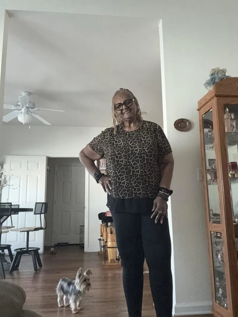 Alicia M., a verified buyer, wearing Finally Fit™ leggings at home